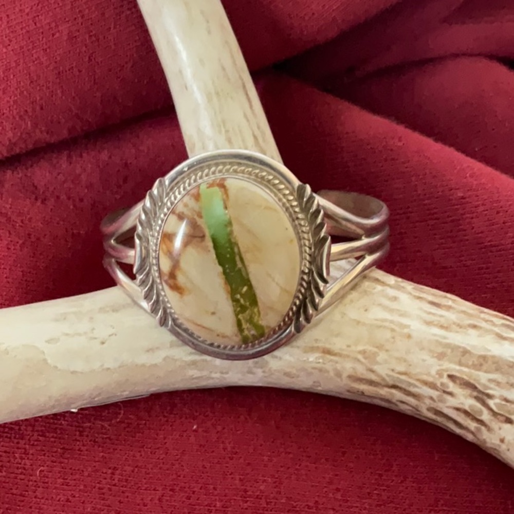 Native-inspire silver cuff with boulder turquoise and epidote vein.